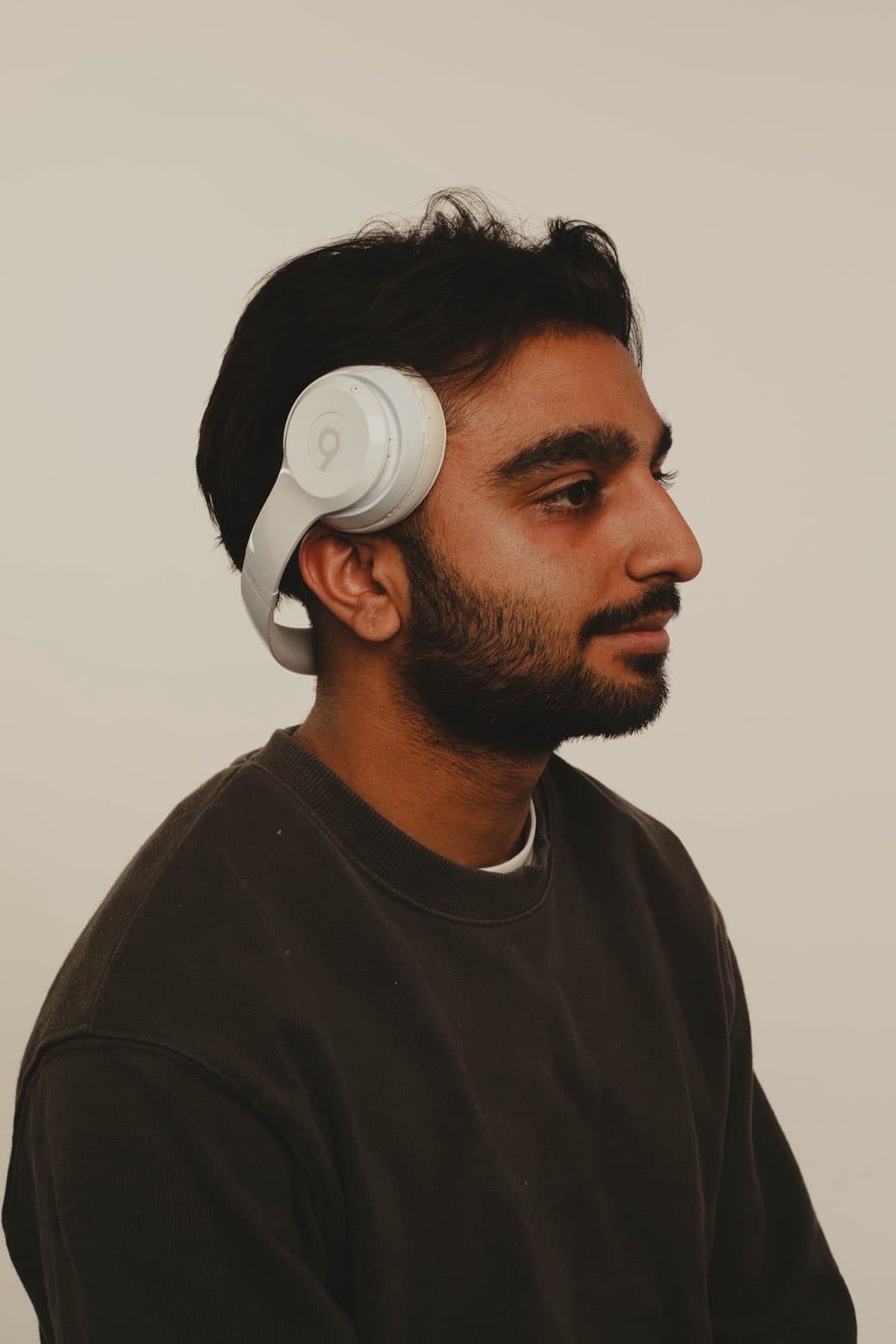 Side profile portrait with white flower accessory
